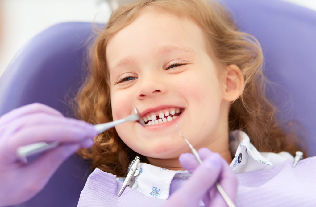 smiling child at the dentist